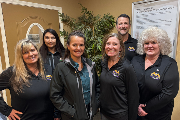 A picture of the staff at the Montezuma Hearing Clinic locations